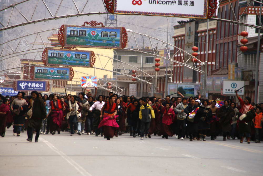 Starting in Lhasa on March 10, 2008 in protests spread throughout Tibet. The photos shows the protest in Labrang, Amdo of March 15, 2008, Tibetan monks took to the streets to protest against oppression.