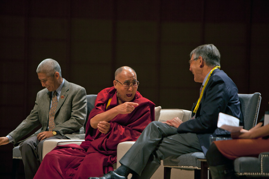 His Holiness the Dalai Lama gesturing during the discussion on 'The Art and Science of Education of the Heart' at the University of British Columbia's Chan Center for Perfoming Arts in Vancouver, Canada on October 22, 2014. (Photo courtesy /Robert Semeniuk, OHHDL)