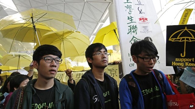 Three pro-democracy student leaders from Hong Kong have been stopped from boarding a plane to Beijing.