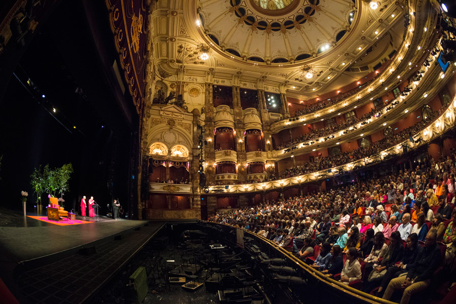 His Holiness the Dalai Lama speaking to an audience of 2300 in celebration of 'Ahimsa - India Day' at the London Coliseum in London, England on September 20, 2015. (Photo courtesy/Ian Cumming)