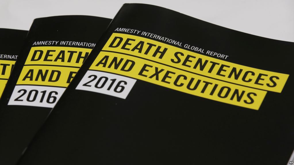 Copies of a report on the death penalty are displayed during a Amnesty International press conference in Hong Kong, April 10, 2017. (Photo courtesy: AP)