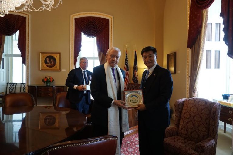 Tibetan Sikyong Dr. Lobsang Sangay presenting Kashag’s Souvenir to Senator Orrin Hatch. (Photo courtesy: tibet.net)