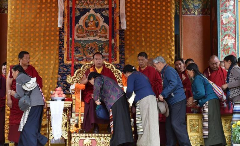 Gyaincain Norbu, the so-called 11th Panchen Lama appointed by China  holds a head-touching ritual for Buddhists in Lhasa, Tibet on July 30, 2017. (Photo courtesy: Xinhua)