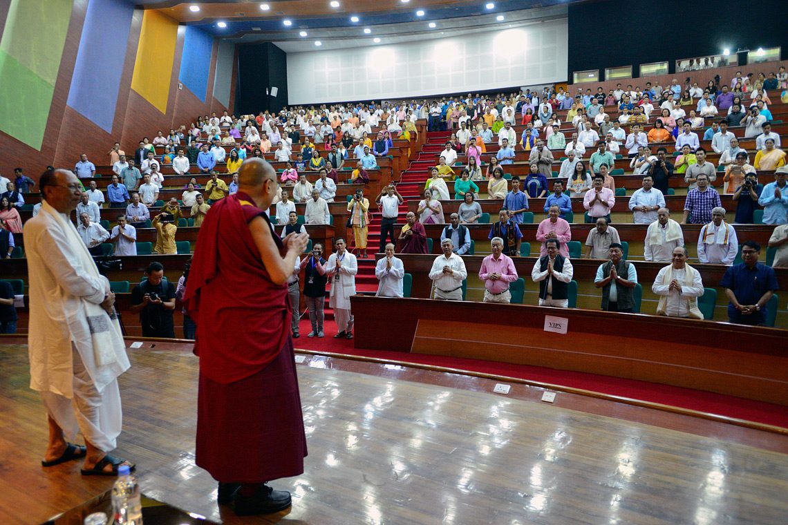 His Holiness the Dalai Lama greeting   the audience at the City Convention Center hall in Imphal, Manipur, India on October 18, 2017. (Photo courtesy: L Tsering/OHHDL)