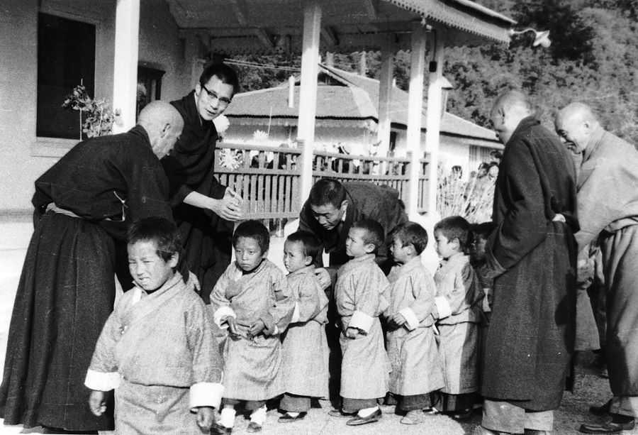 His Holiness the Dalai Lama with early Tibetan refugee students in Dharamshala, India in 1960s. (Photo courtesy: OHHDL)