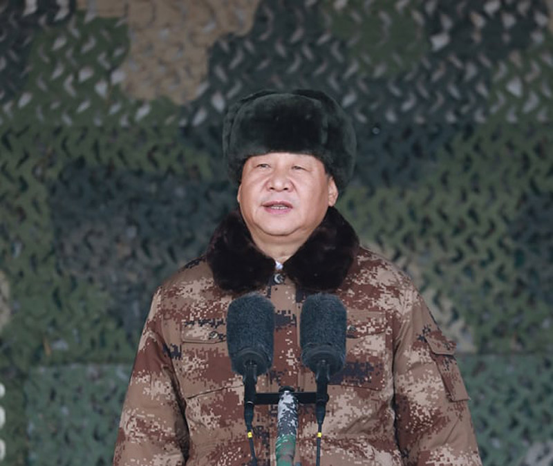 President Xi wore combat fatigues and black leather gloves in his speech to thousands of military personnel. (Photo courtesy: Xinhua)