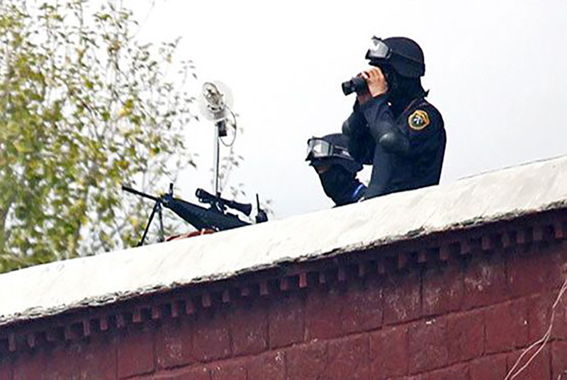 Chinese secret surveillance on Tibetans from the roofs of Buildings in Lhasa. (Photo coutesy: TPI)