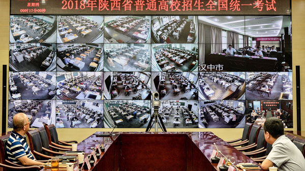 Staff members monitor test venues as students take China's annual national college entrance examination, or 'gaokao,' in Xian, north-central China's Shaanxi province, June 7, 2018. (Photo courtesy; REUTERS)