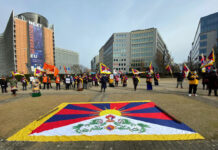 62nd Tibet Uprising Day: Ominous fall for Chinese flag from its embassy building in Brussels before Tibet protesters