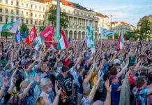 Hungarians protest, including with Tibetan flags, against Chinese university plan in Budapest