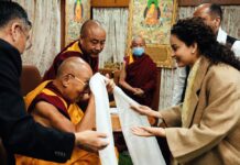 Bollywood star calls on Dalai Lama as she campaigns for parliament seat