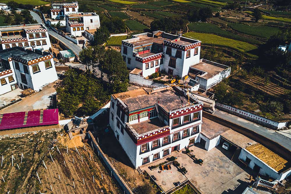 China alleged to destroy religious features on exteriors of Tibetan homes