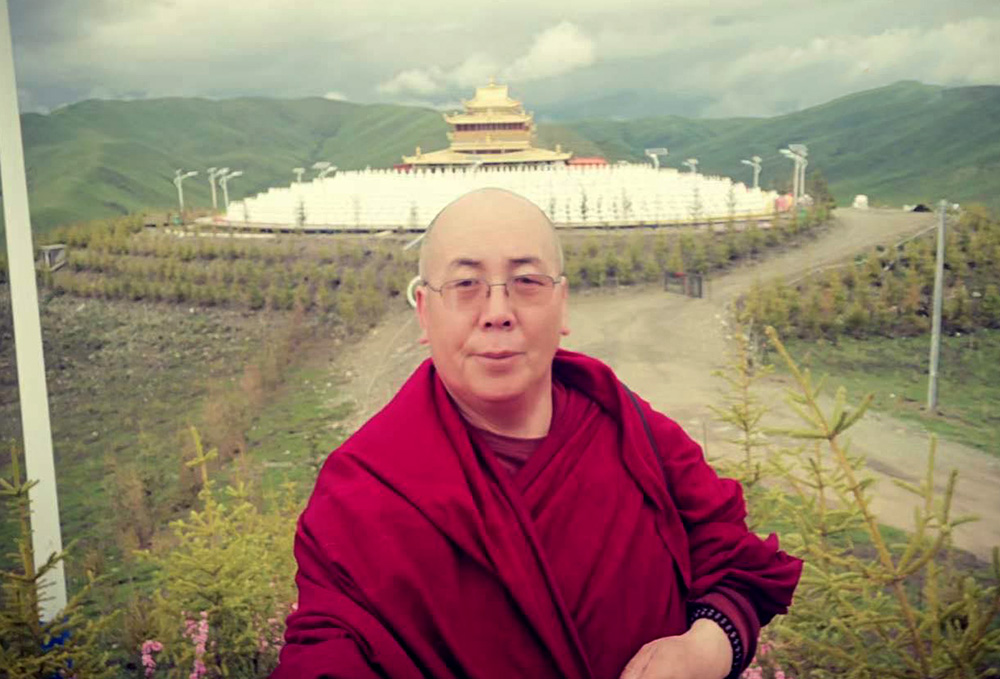 China jails monk for Tibetan uprising voice message, online display of Dalai Lama speech