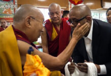 Hollywood star Whitaker, well known for his charity work, visits Dalai Lama