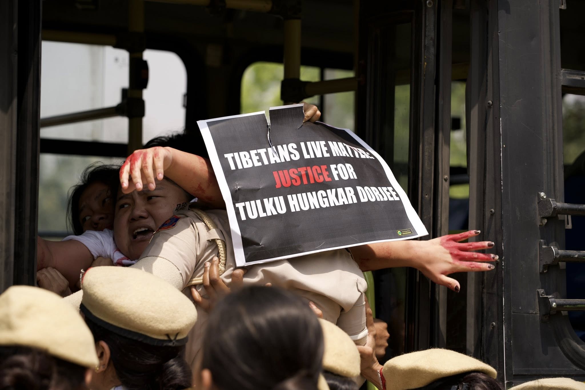 Tibetan youth activists held as they protested before New Delhi Chinese embassy over lama’s sudden death