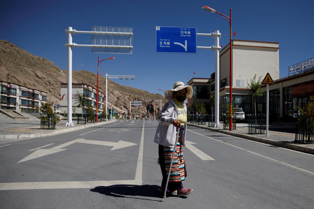 Slogans of assimilation, false narratives greeted journalists on chaperoned tour of Tibet