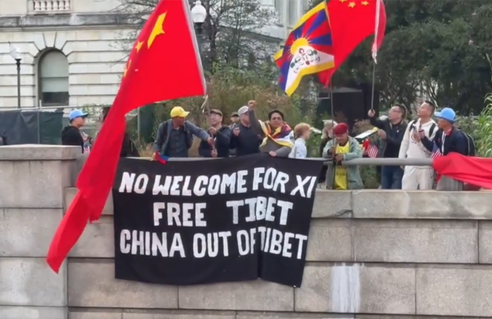 Chinese supporters attack Tibetan, other protesters as President Xi lands in US for state visit